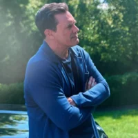 Andrew's Blue Cardigan on Your Friends & Neighbors S01E09