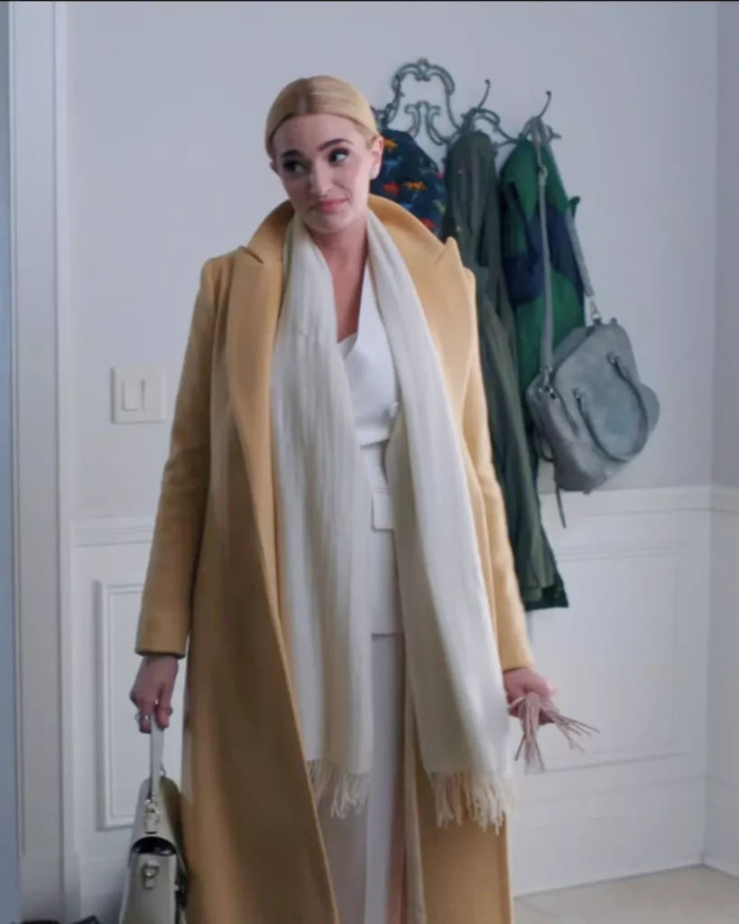 Georgia's White Outfit with Gold Jacket