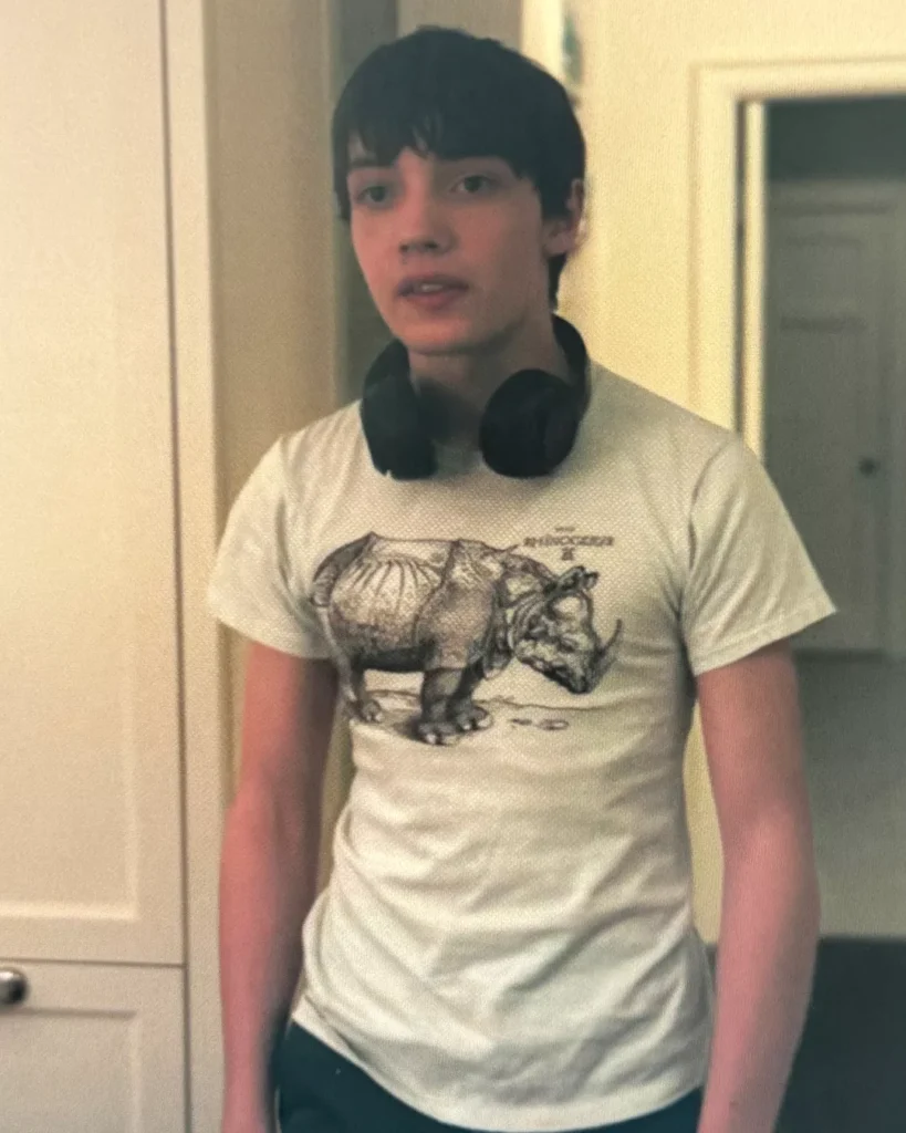 Hunter's Rhino Graphic Tee on Your Friends & Neighbors S01E05