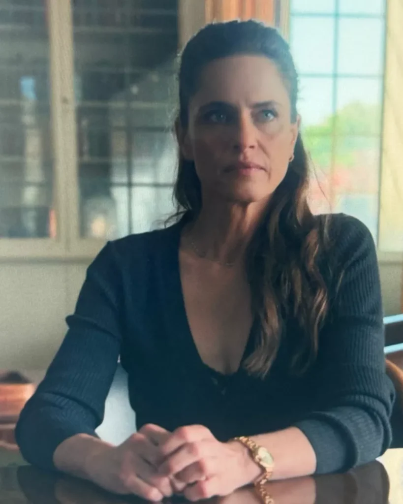 Mel's Blue Sweater on Your Friends & Neighbors S01E05