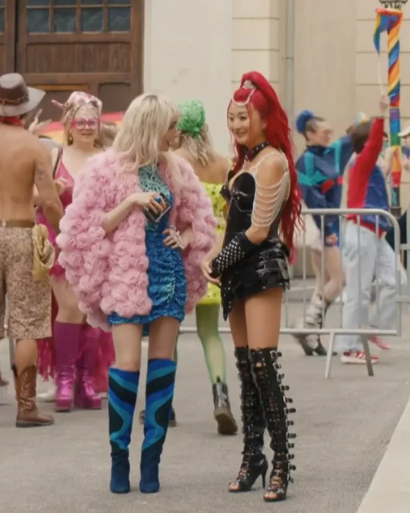 Mindy’s Black Boots and silver earrings
