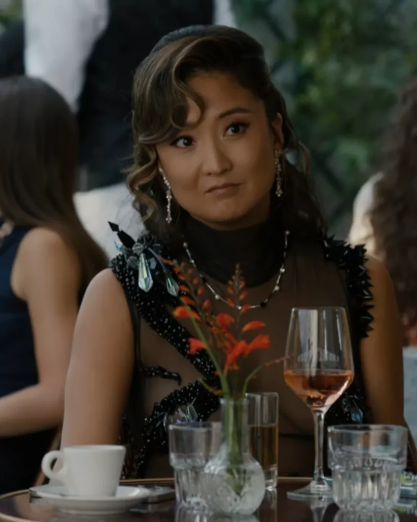 Mindy’s Black Dress and red embellished heel sandals