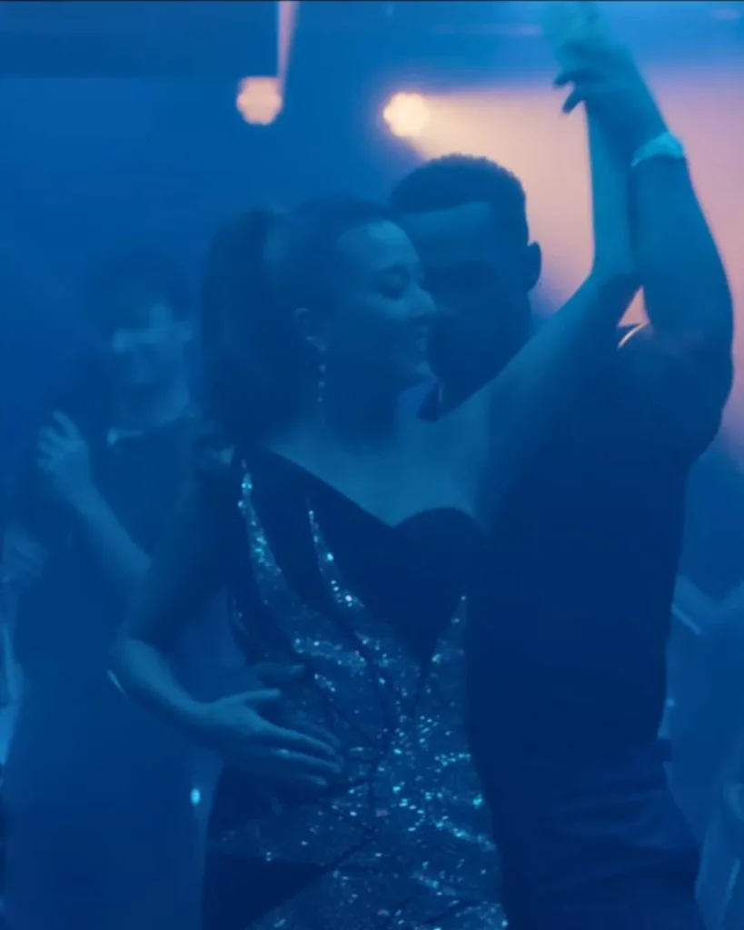 Mindy’s One-Shoulder Gold and Black Dress
