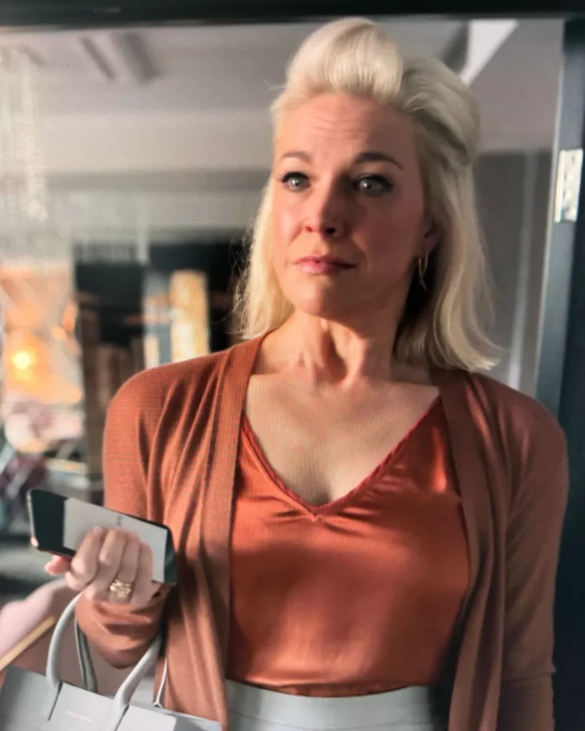 Rebecca's Orange Blouse and Sweater