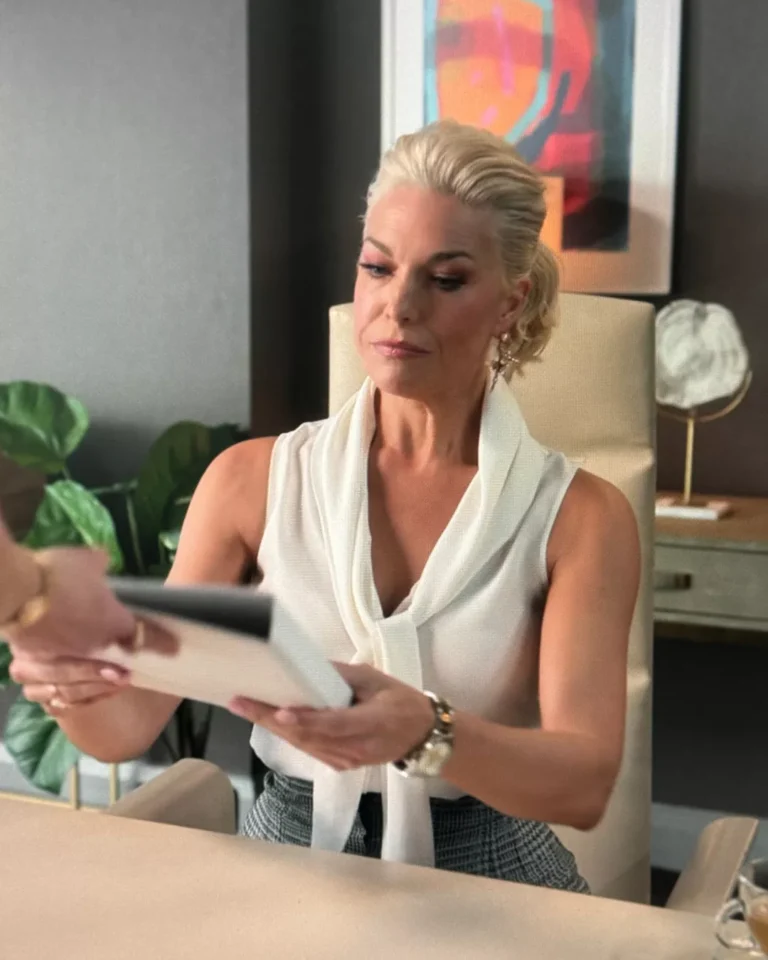 Rebecca's White Sleeveless Blouse