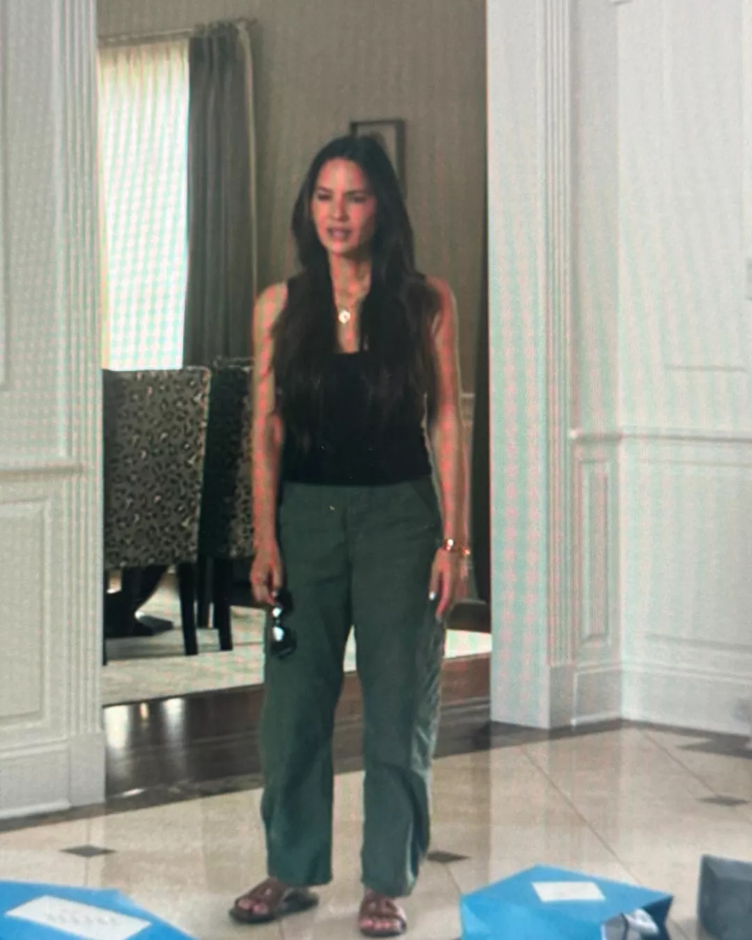 Samantha's Blue Tank Top and leather sandals