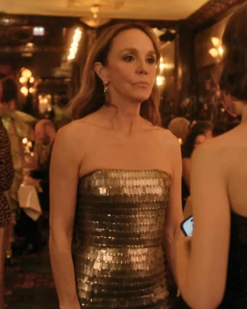 Sylvie’s silver metallic dress and sunglasses
