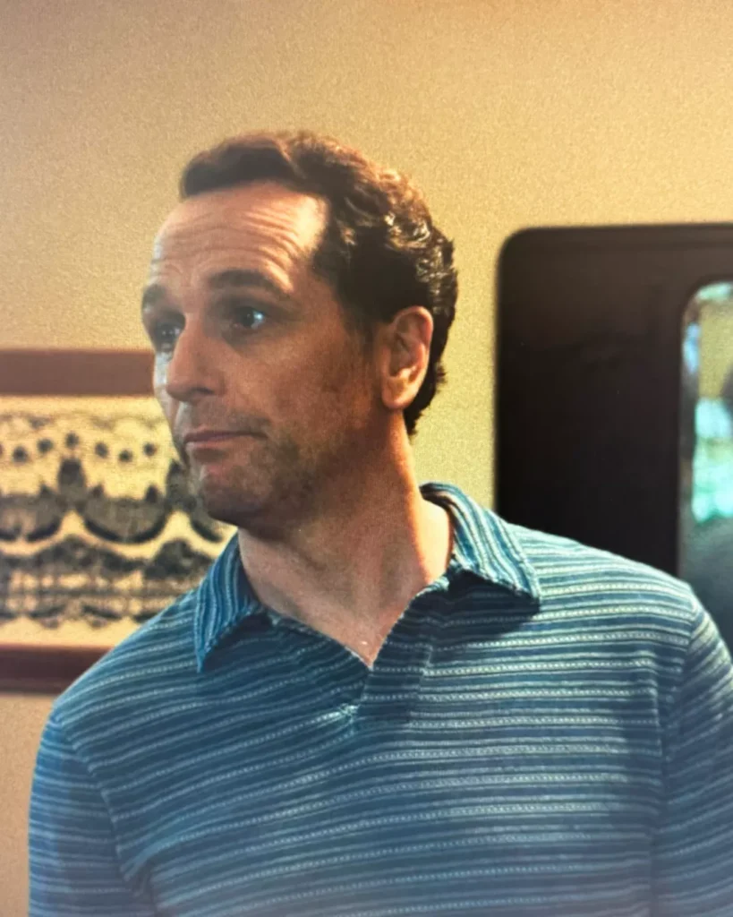 Tom's Blue Striped Polo on Widow's Bay S01E03
