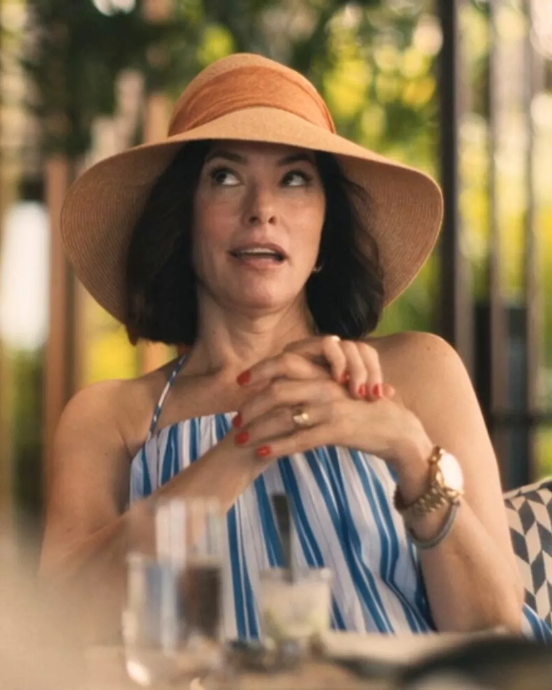 Victoria's sun hat, watch and blue and white striped dress