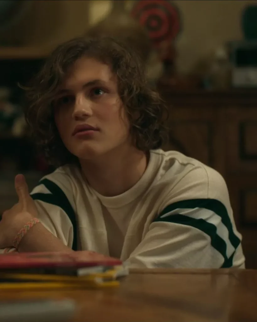 Young Sam's White Tee With Blue Stripes on Every Year After S01E02